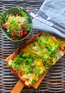 Summer tarte flambée with yellow zucchini