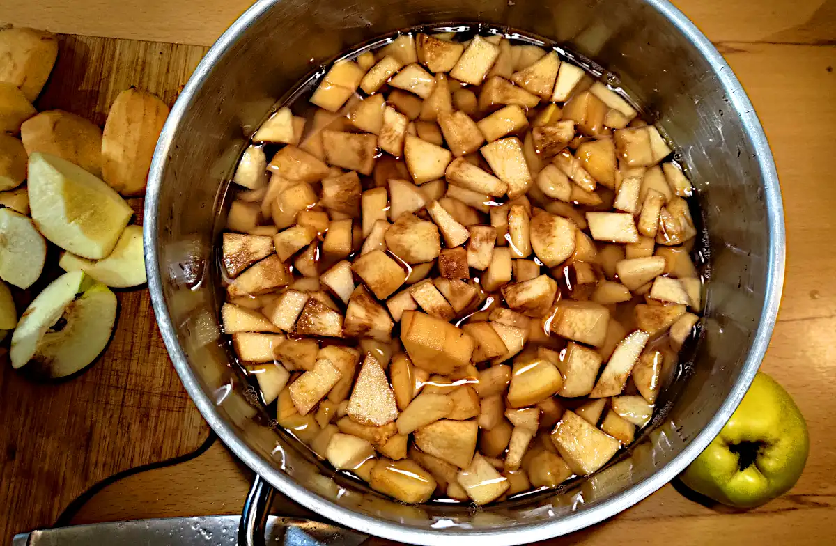 Quince pieces in a pot